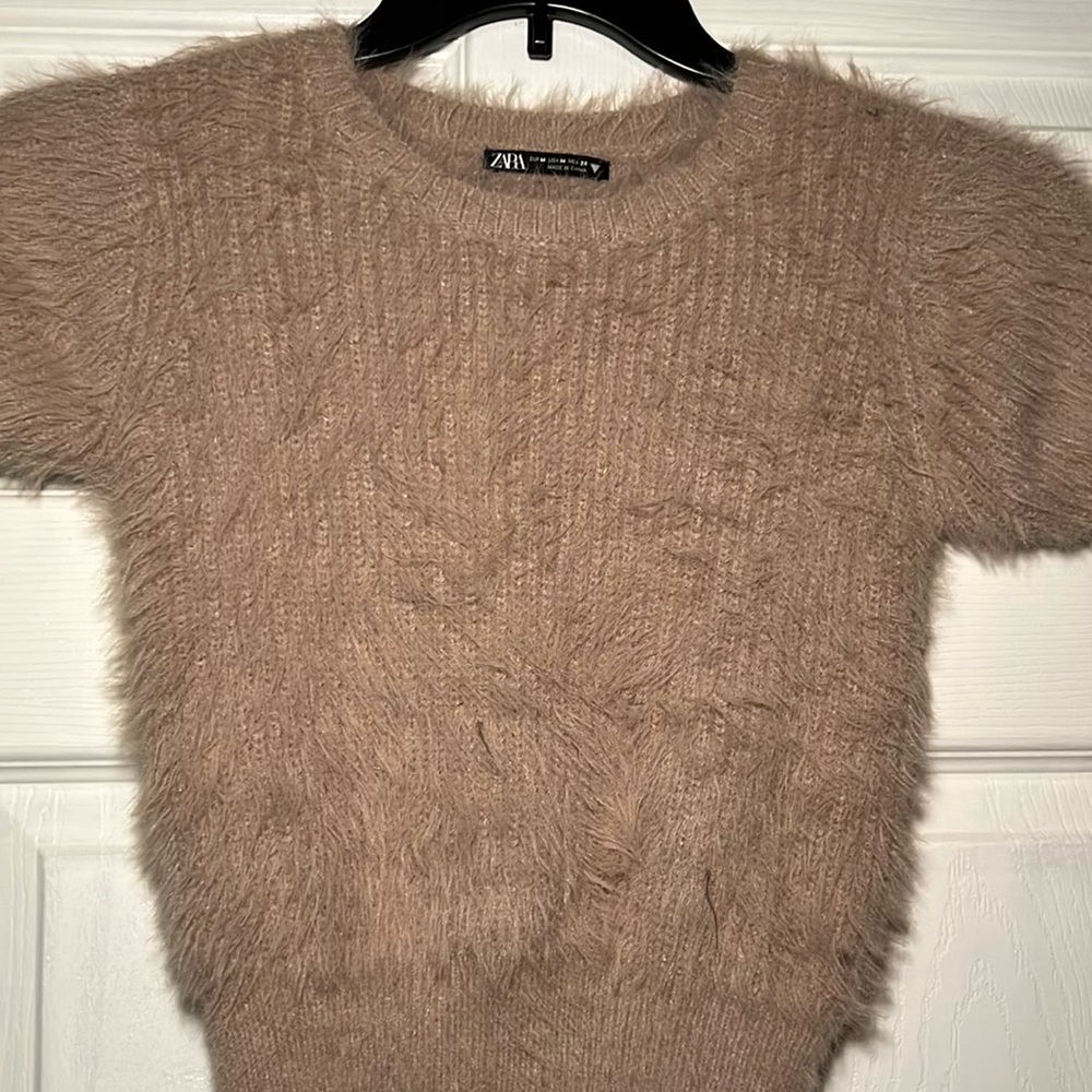 Like New!
Comfy, light and nude top
Lovely for a night out